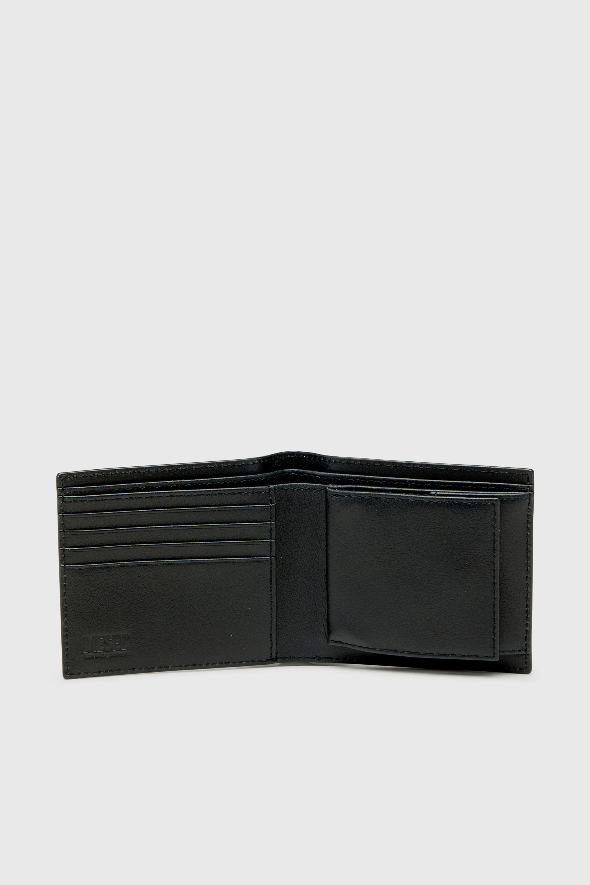 Diesel - MONOGRAM BI-FOLD COIN S 3D, Man's Leather bi-fold wallet with all-over embossed logo in Black - 3